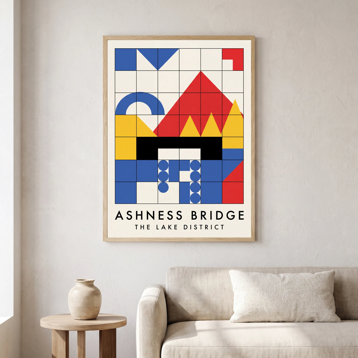 Ashness Bridge travel poster in a natural frame, hanging in a living