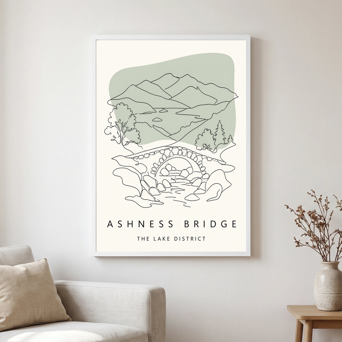 Ashness Bridge travel poster in a white frame, hanging in a living2