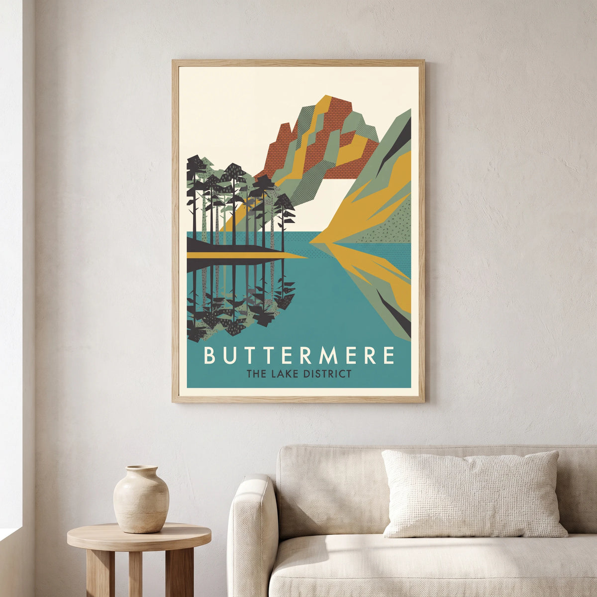 Buttermere travel poster in a natural frame, hanging in a living