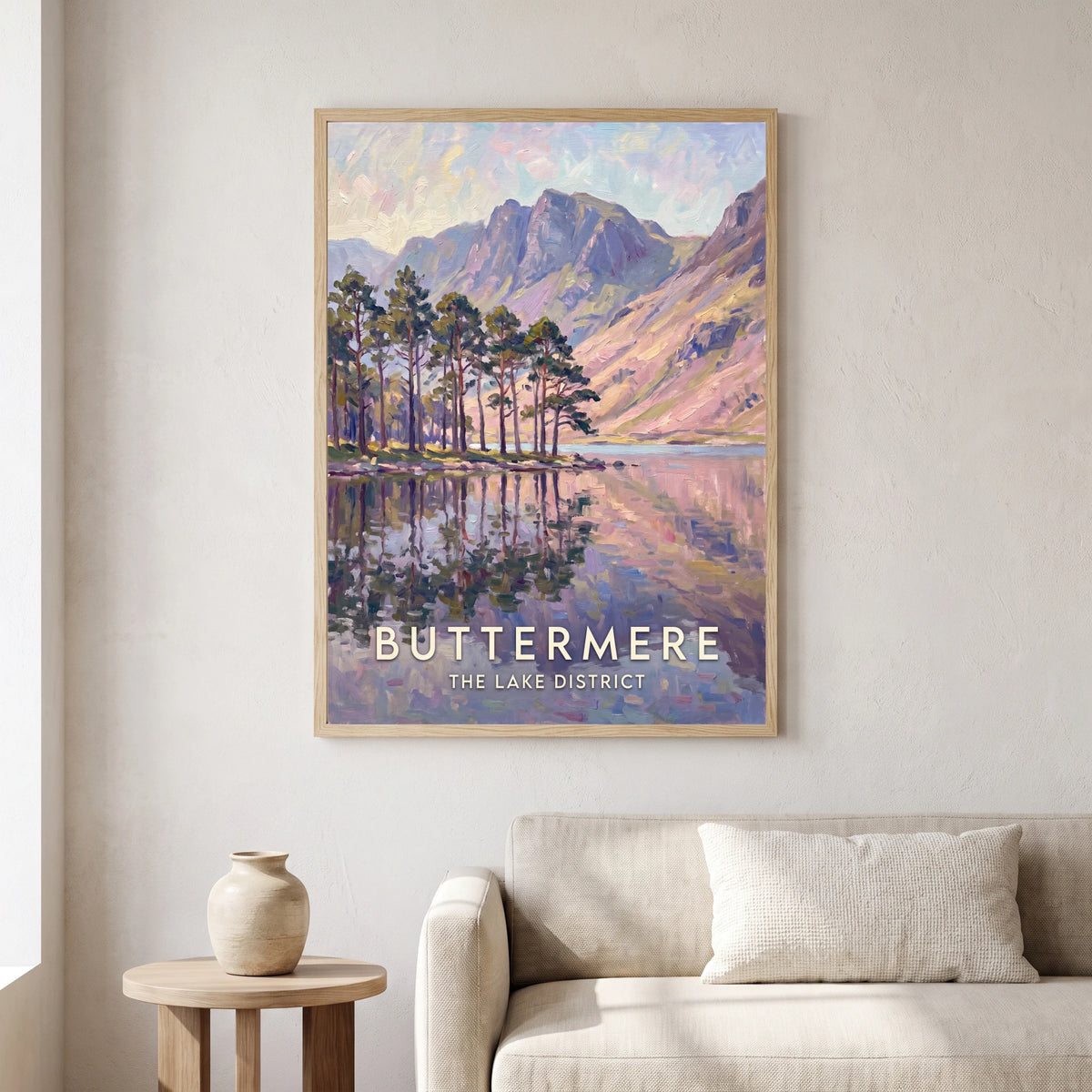 Buttermere travel poster in a natural frame, hanging in a living