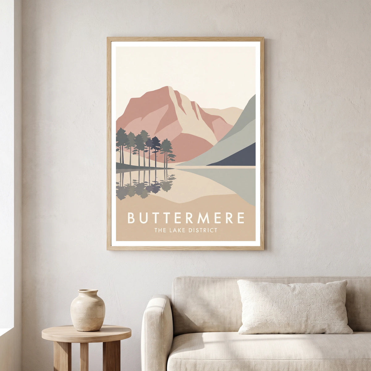 Buttermere travel poster in a natural frame, hanging in a living