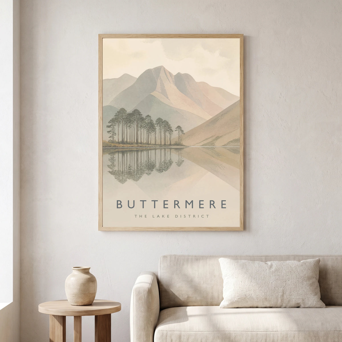 Buttermere travel poster in a natural frame, hanging in a living