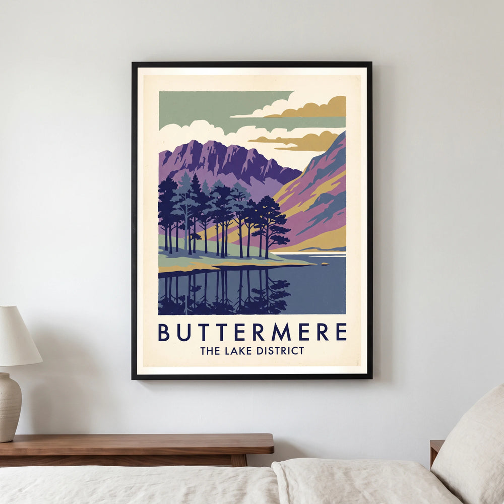 Buttermere travel poster in a black frame, hanging in a bedroom3