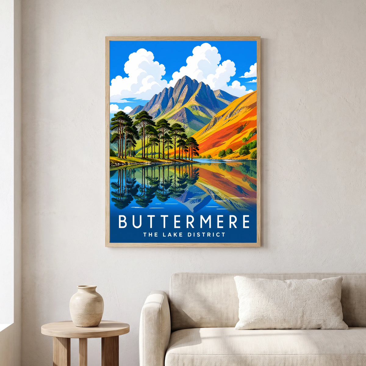 Buttermere travel poster in a natural frame, hanging in a living