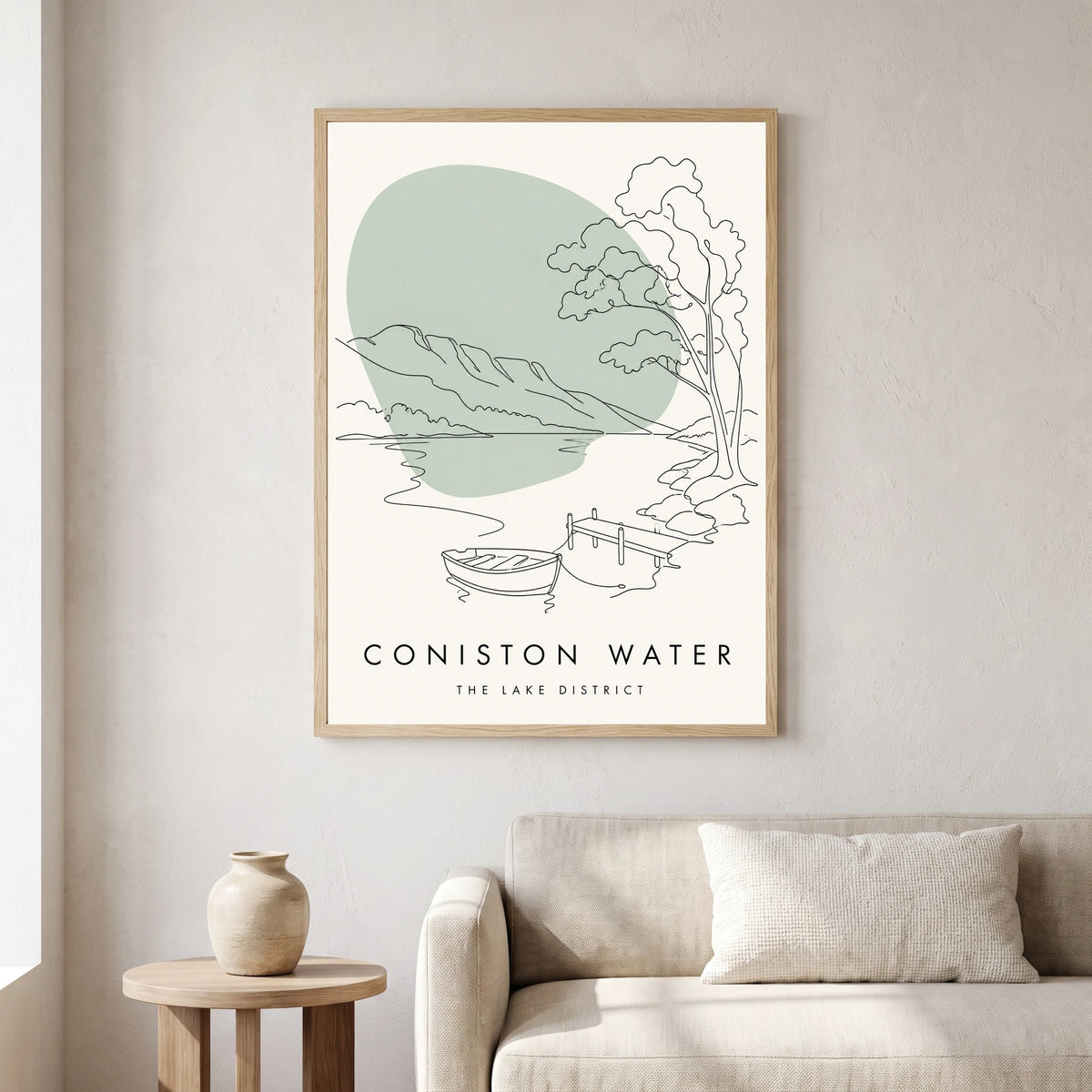 Coniston Water travel poster in a natural frame, hanging in a living