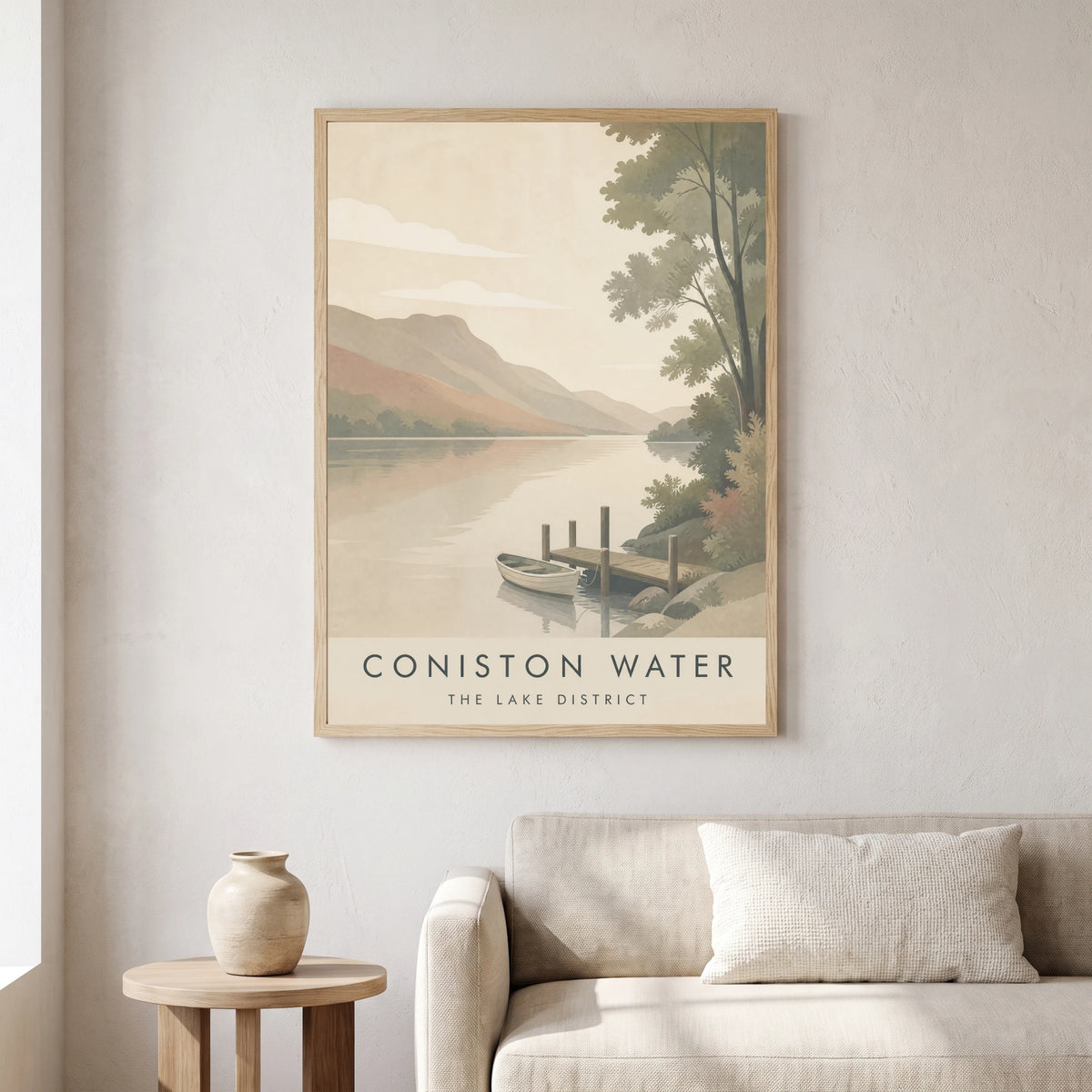 Coniston Water travel poster in a natural frame, hanging in a living