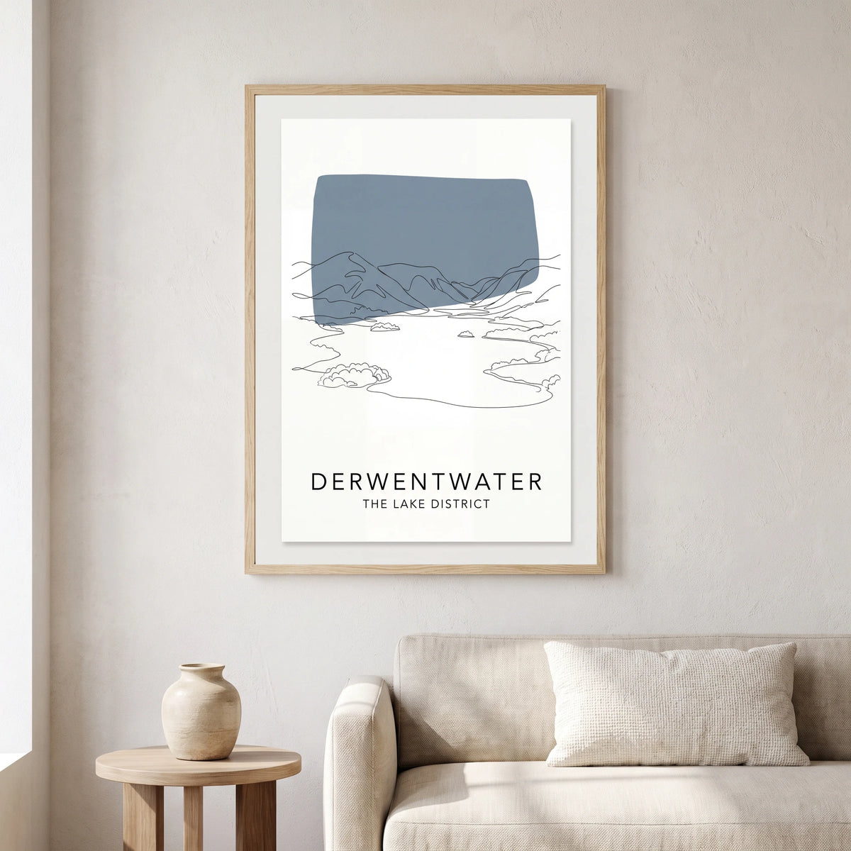 Derwentwater travel poster in a natural frame, hanging in a living