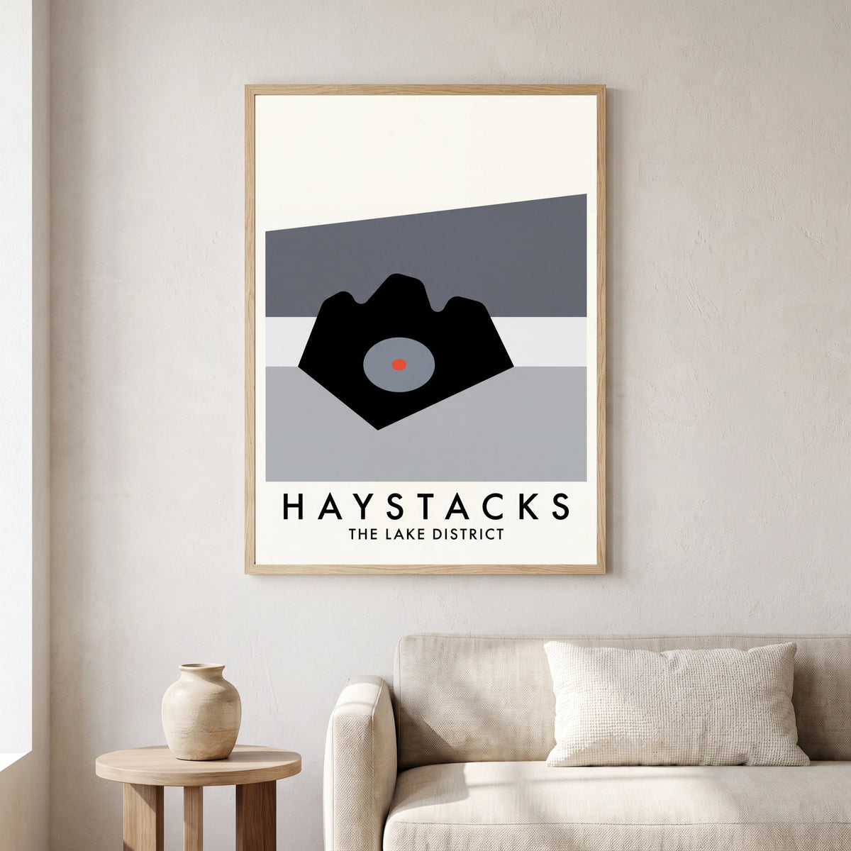 Haystacks travel poster in a natural frame, hanging in a living