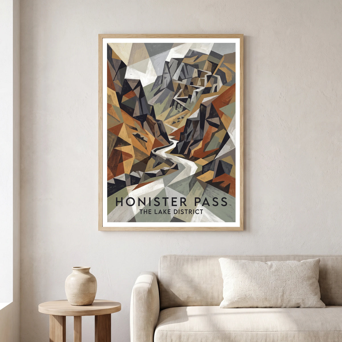 Honister Pass travel poster in a natural frame, hanging in a living