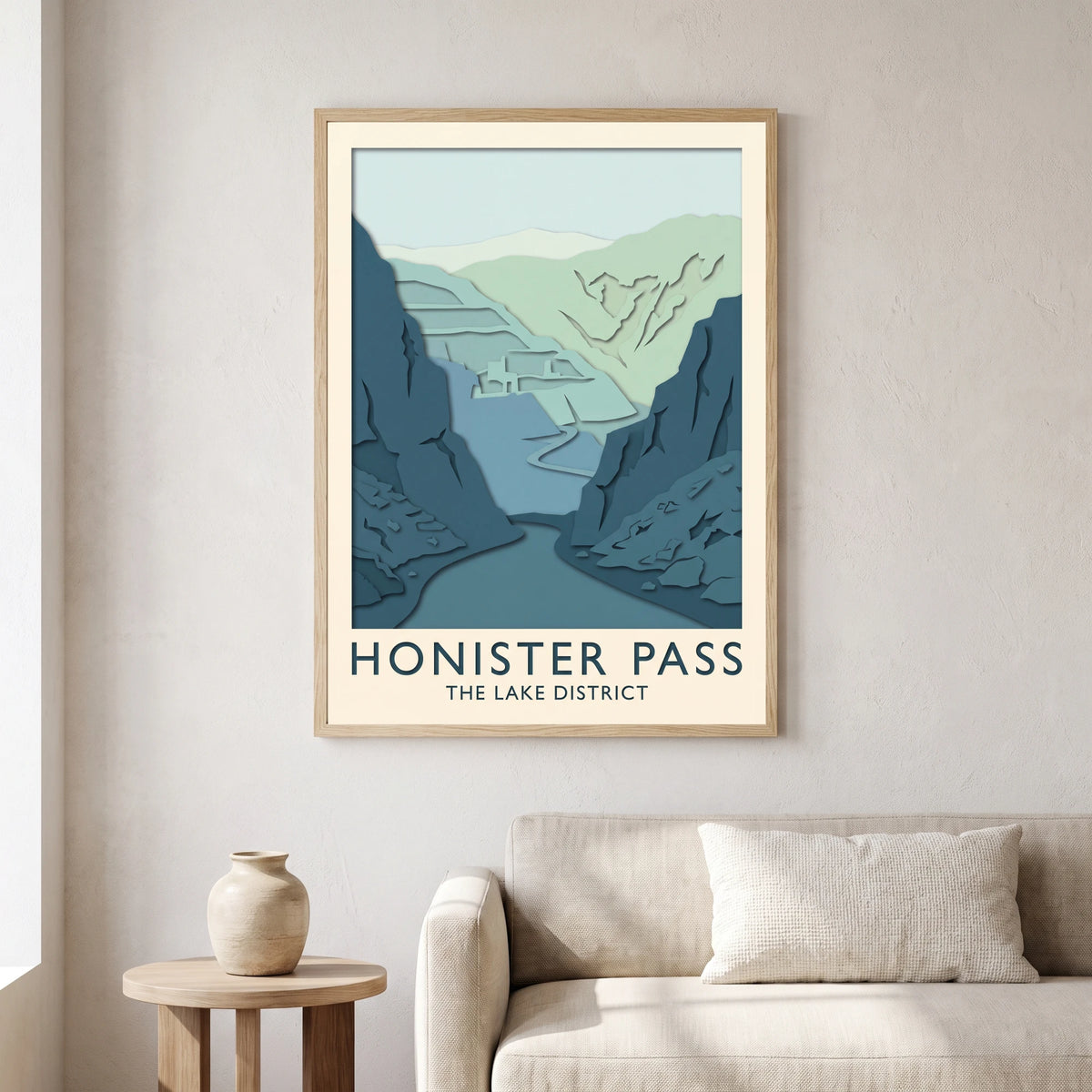 Honister Pass travel poster in a natural frame, hanging in a living