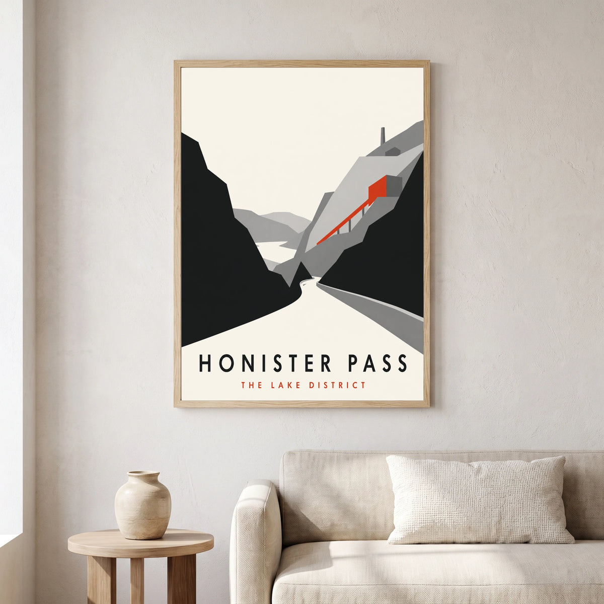 Honister Pass travel poster in a natural frame, hanging in a living
