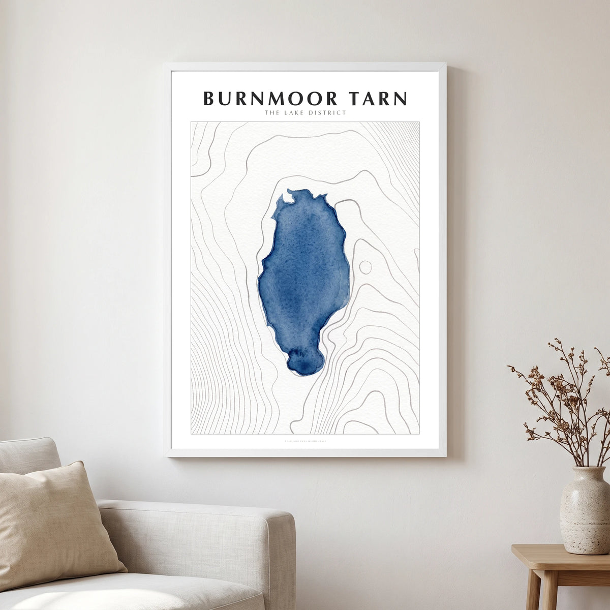 Burnmoor Tarn lake map poster in a white frame, hanging in a living