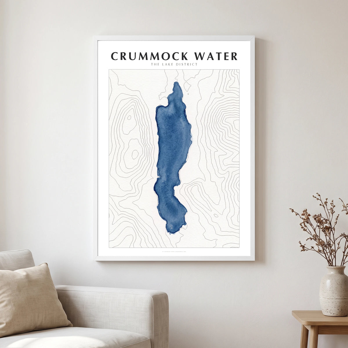 Crummock Water lake map poster in a white frame, hanging in a living