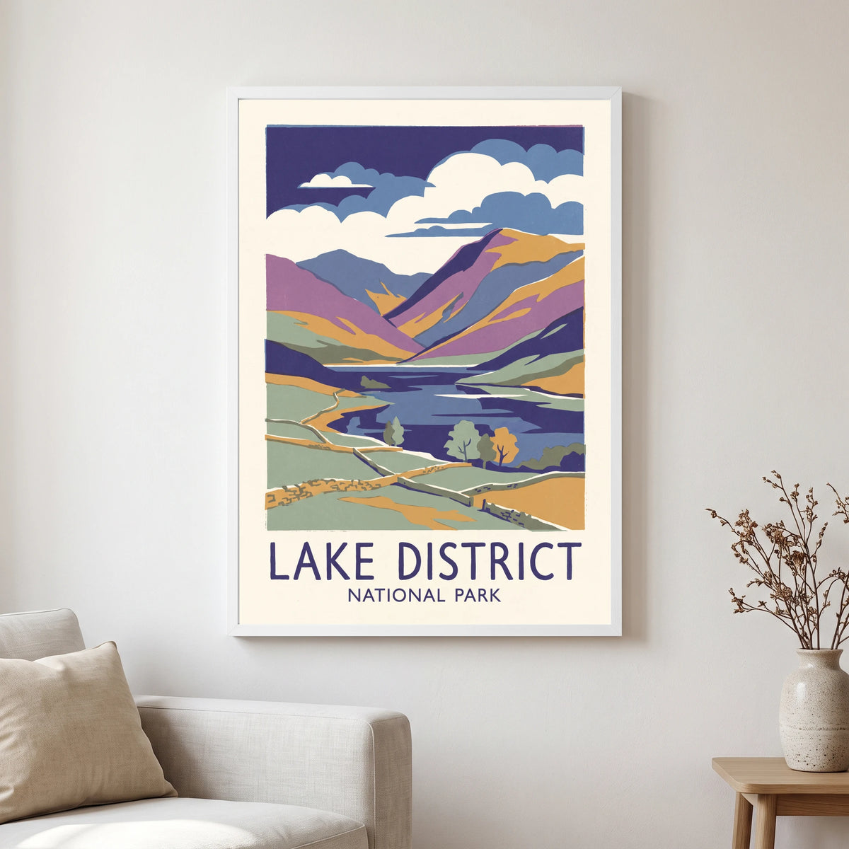 Lake District travel poster in a white frame, hanging in a living2