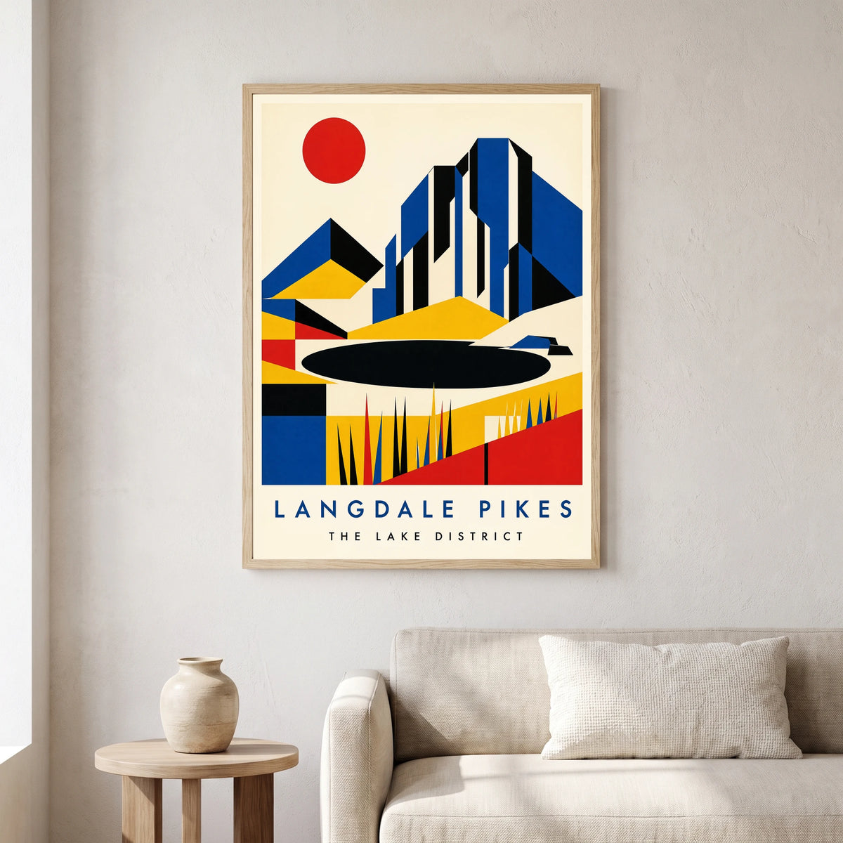 Langdale Pikes travel poster in a natural frame, hanging in a living