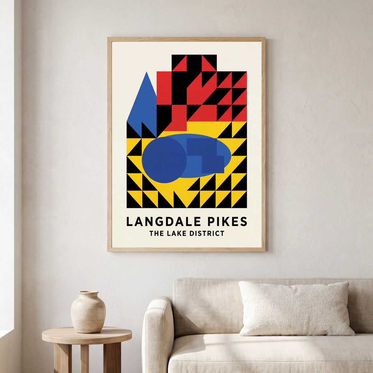 Langdale Pikes travel poster in a natural frame, hanging in a living