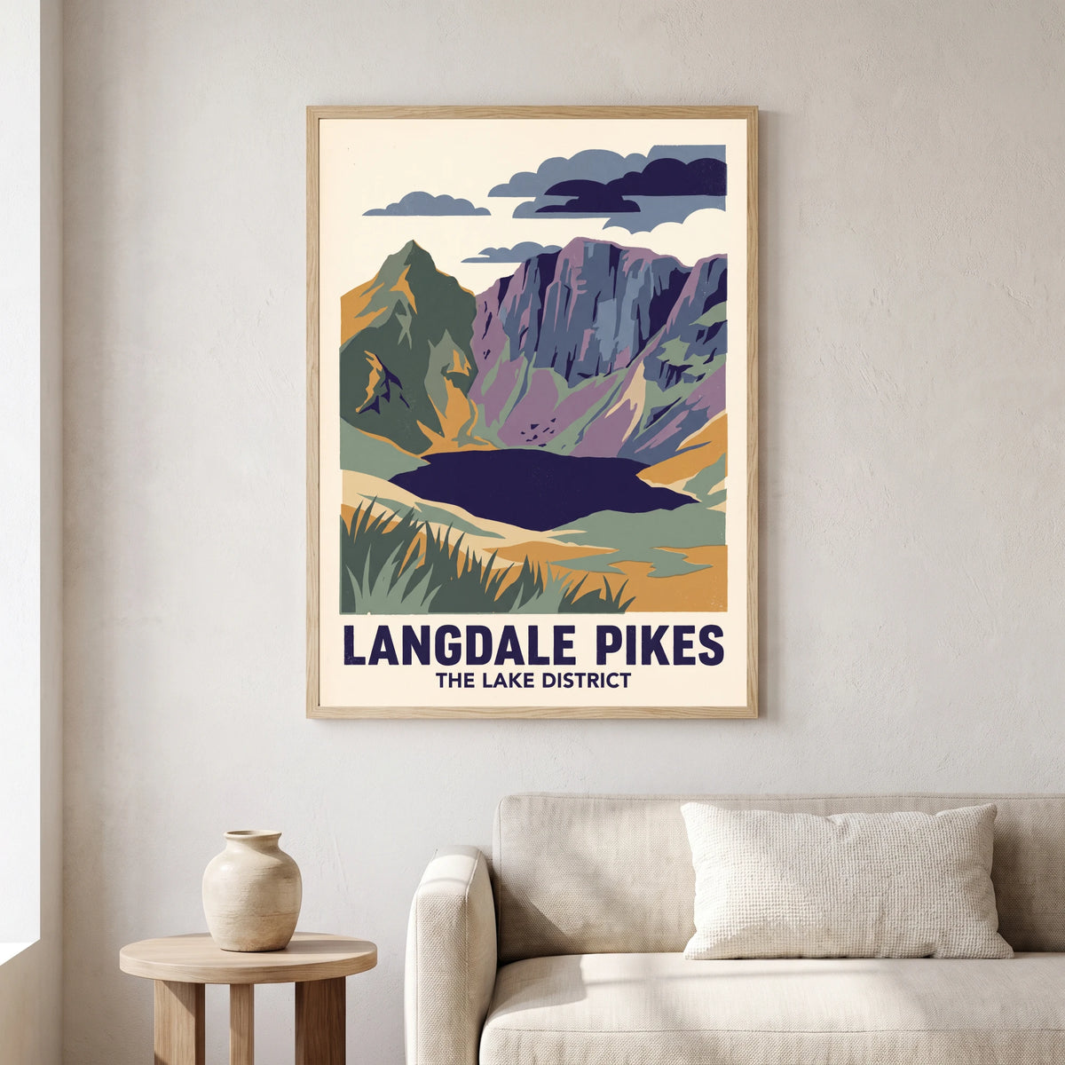 Langdale Pikes travel poster in a natural frame, hanging in a living