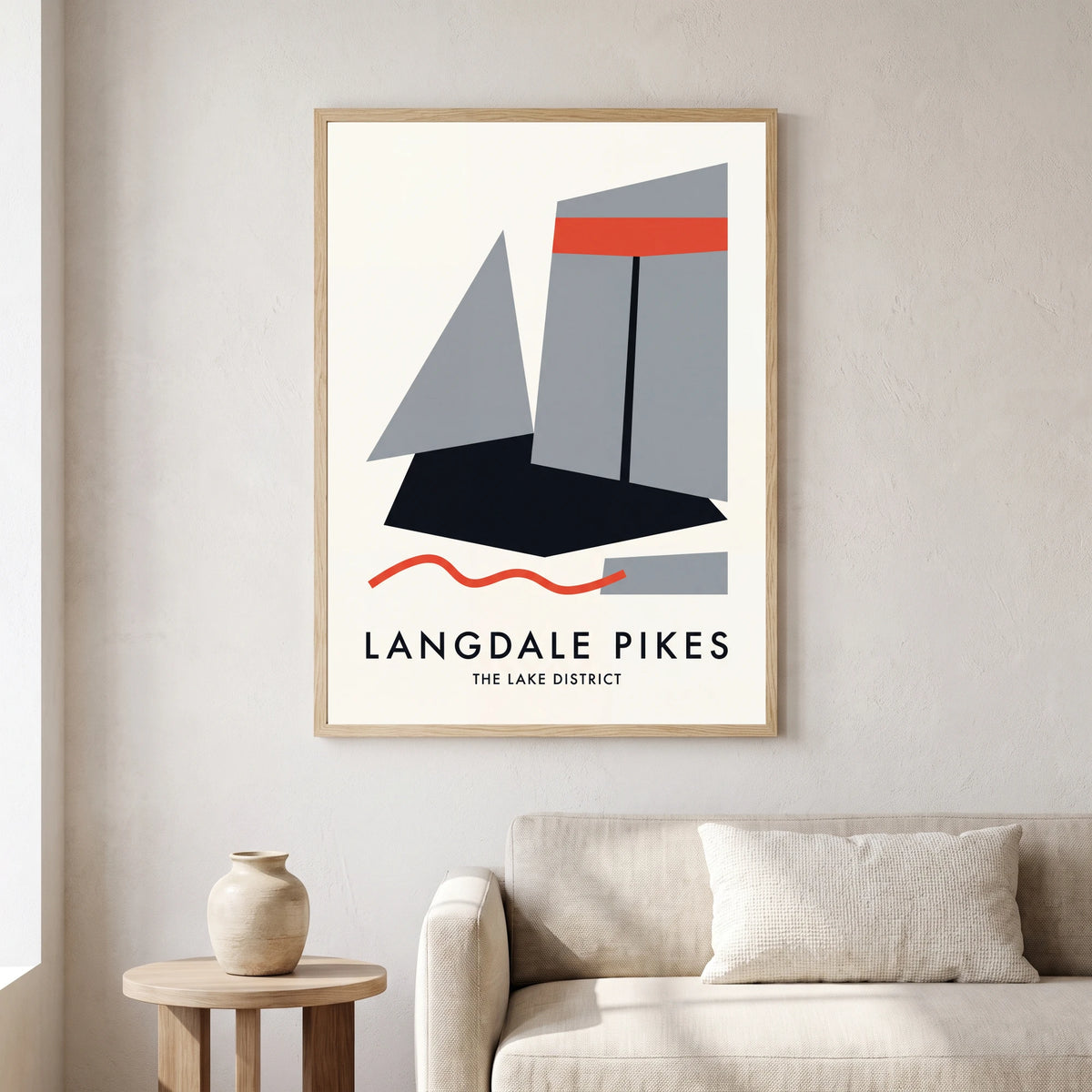 Langdale Pikes travel poster in a natural frame, hanging in a living