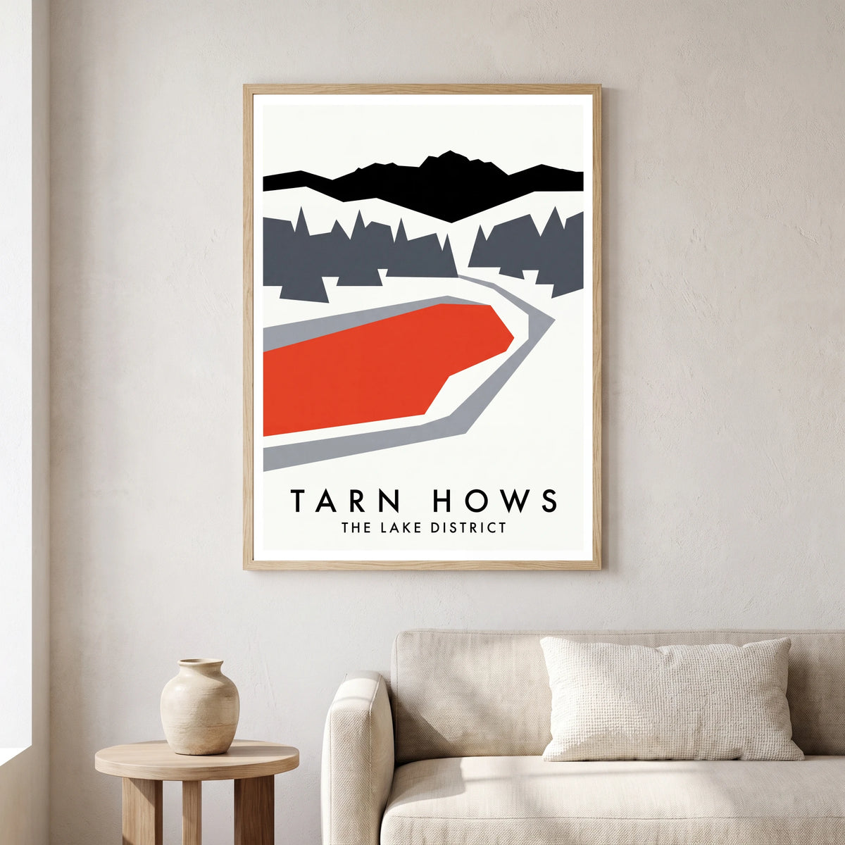Tarn Hows travel poster in a natural frame, hanging in a living