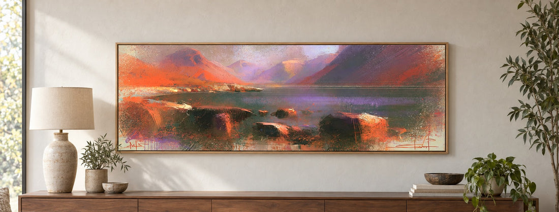 A panoramic canvas of Wast Water and Great Gable at sunset in a natural wood float frame above a walnut sideboard