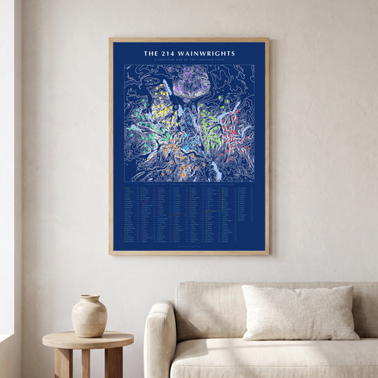 The 214 Wainwrights blueprint contour map poster in a natural frame, hung on a wall