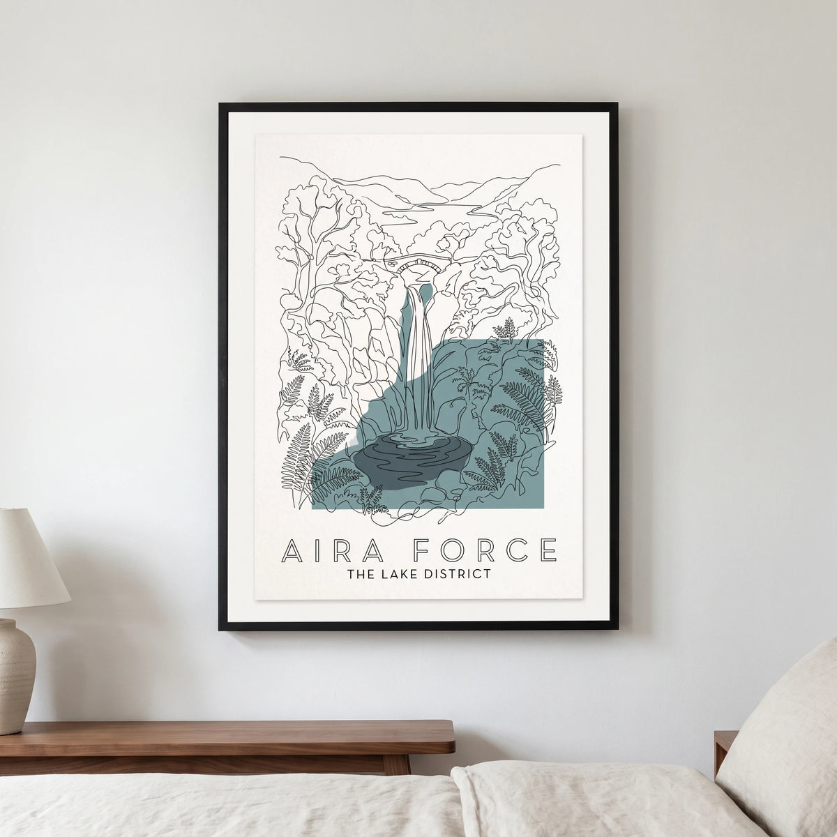 Aira Force travel poster in a black frame, hanging in a bedroom3