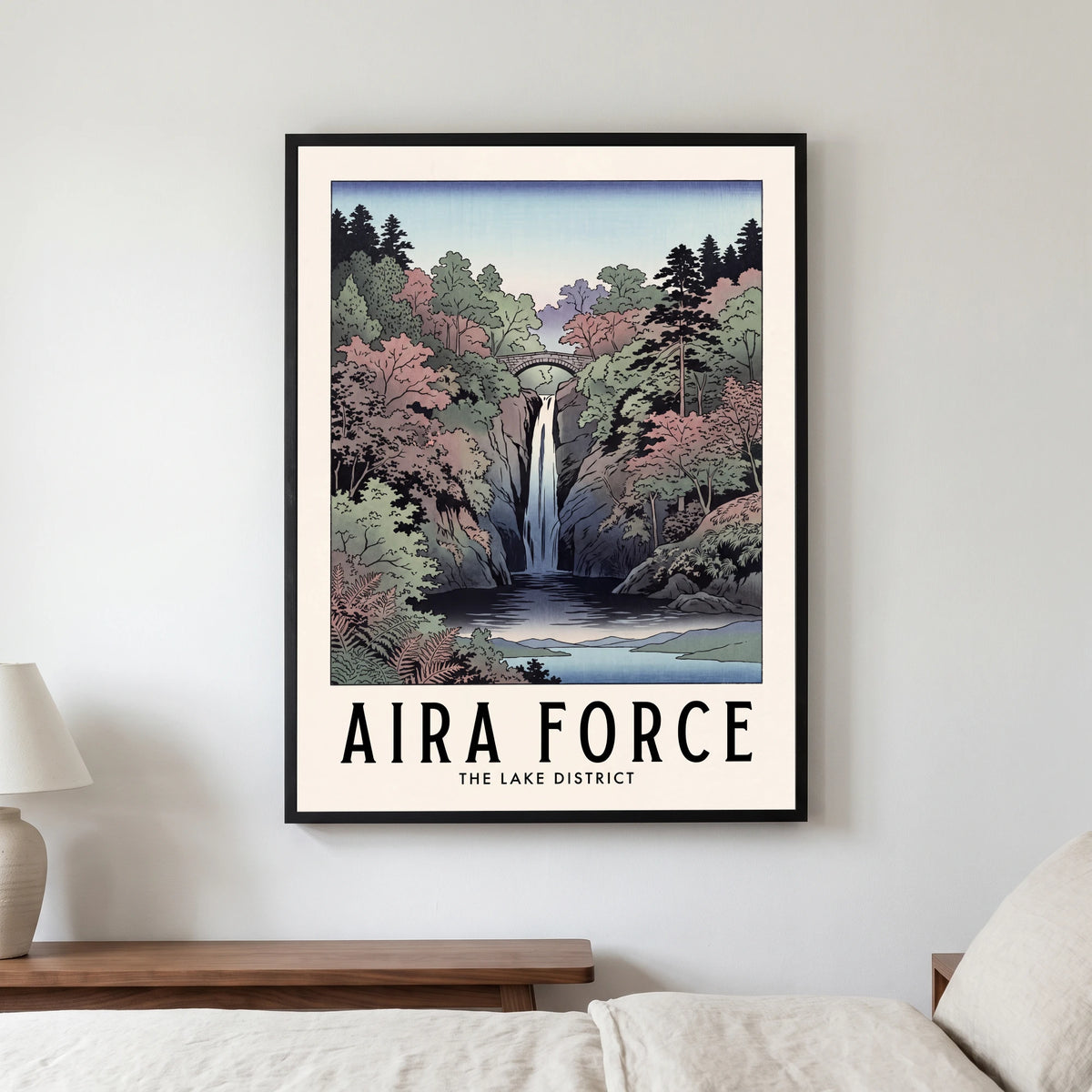 Aira Force travel poster in a black frame, hanging in a bedroom3