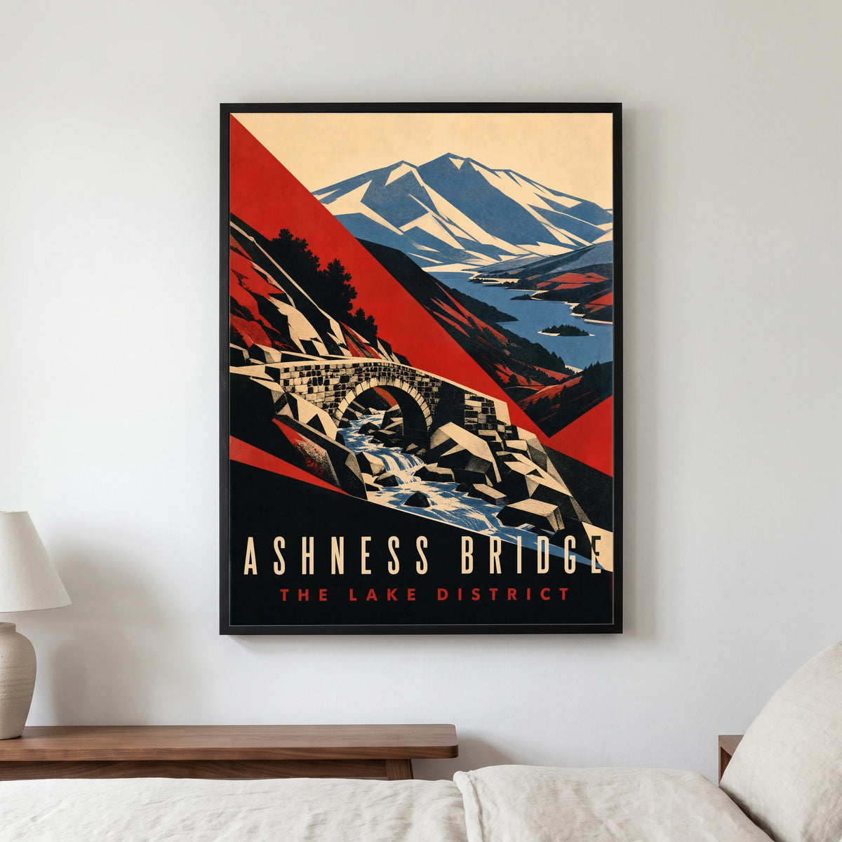 Ashness Bridge travel poster in a black frame, hanging in a bedroom3