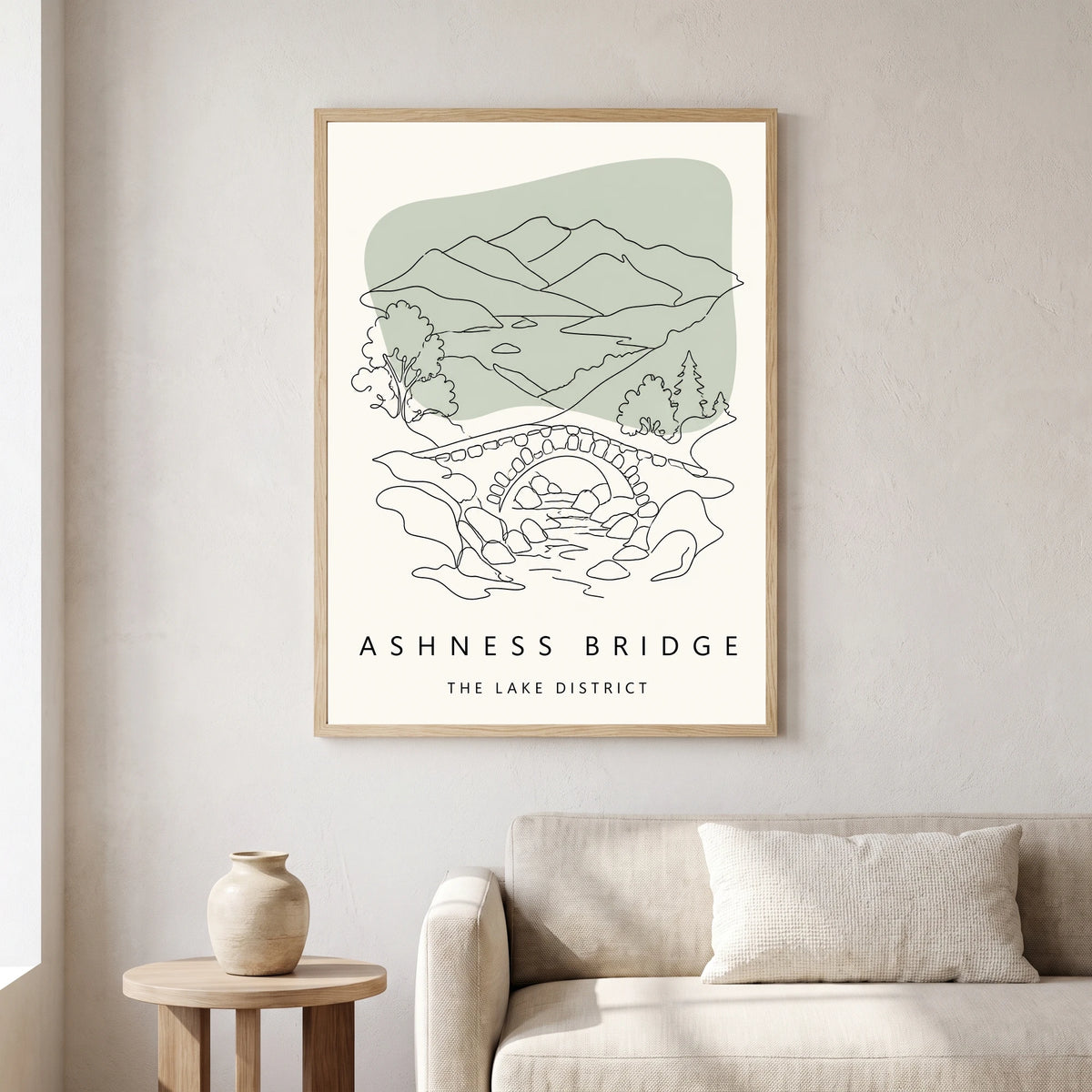 Ashness Bridge travel poster in a natural frame, hanging in a living