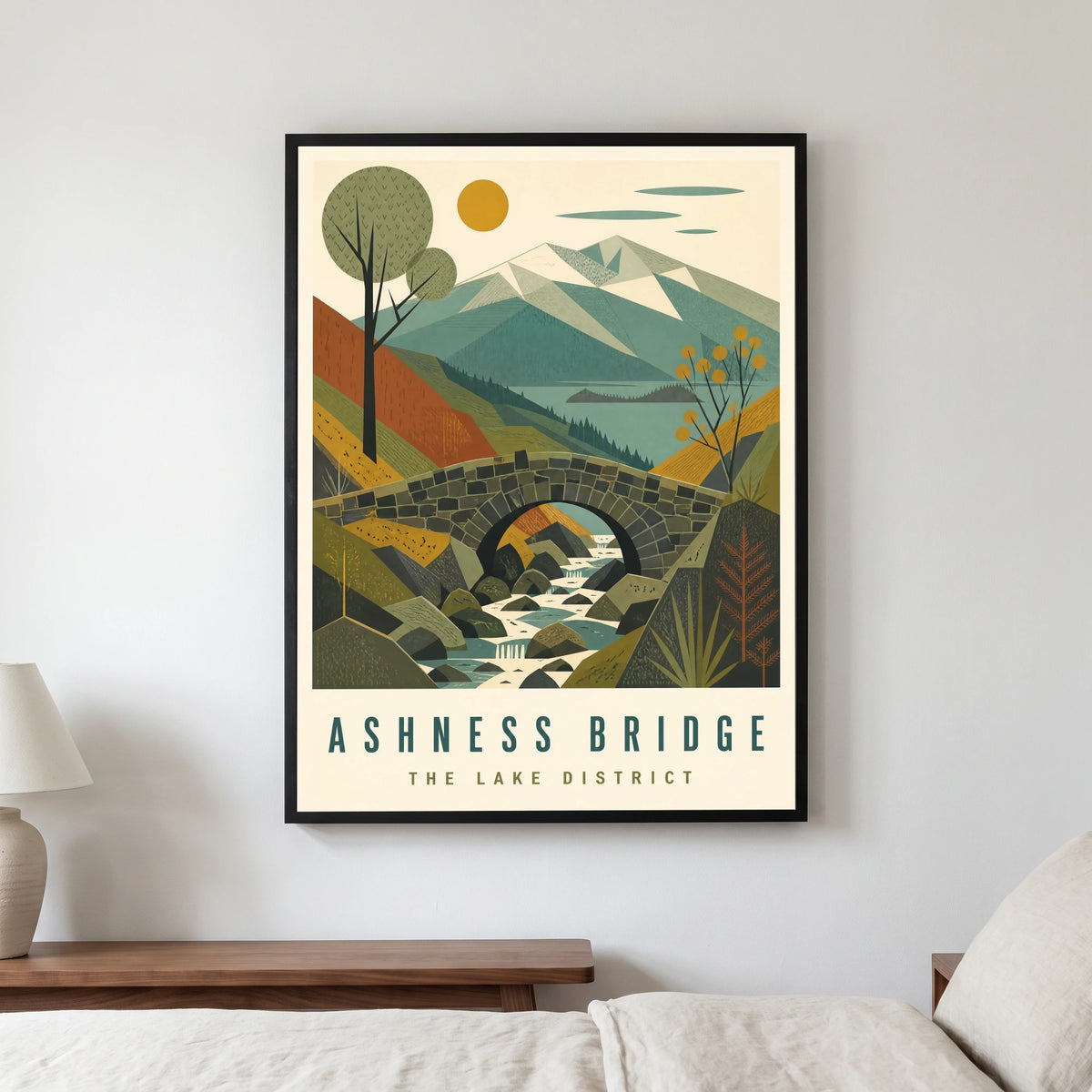 Ashness Bridge travel poster in a black frame, hanging in a bedroom3