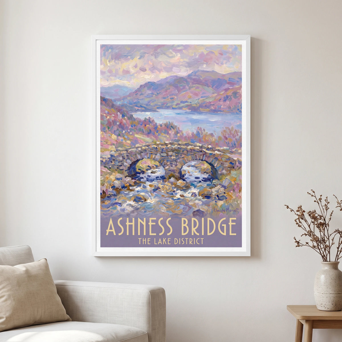 Ashness Bridge travel poster in a white frame, hanging in a living2