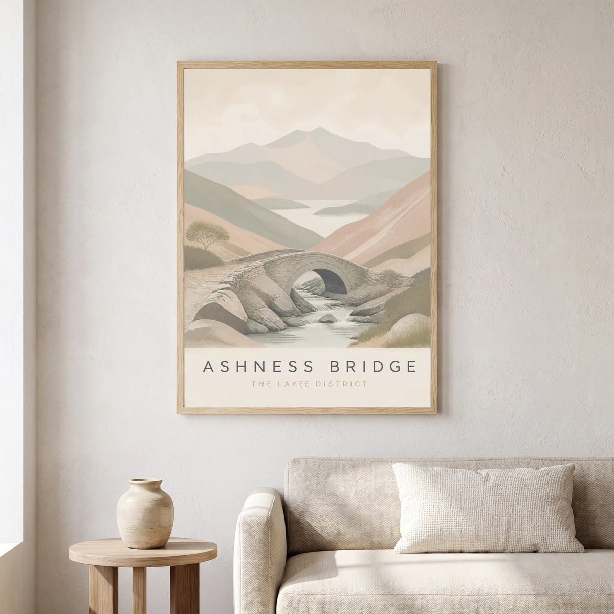 Ashness Bridge travel poster in a natural frame, hanging in a living