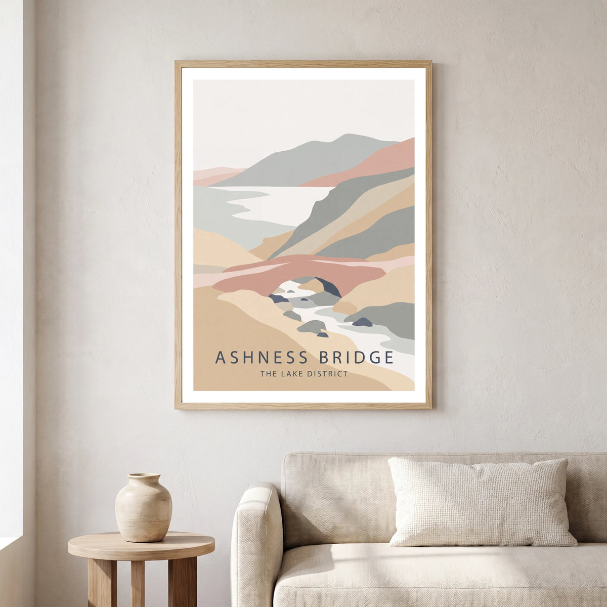 Ashness Bridge travel poster in a natural frame, hanging in a living