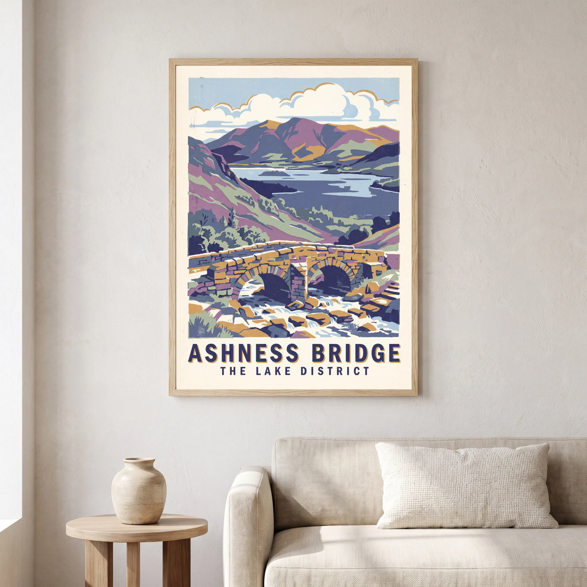 Ashness Bridge travel poster in a natural frame, hanging in a living