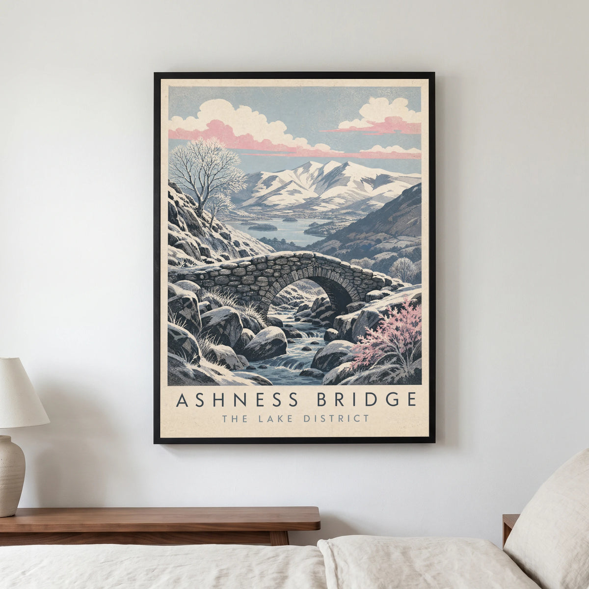 Ashness Bridge travel poster in a black frame, hanging in a bedroom3