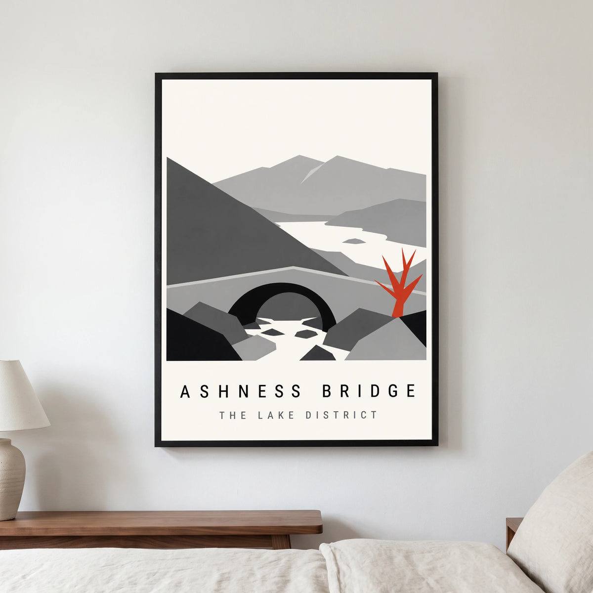 Ashness Bridge travel poster in a black frame, hanging in a bedroom3