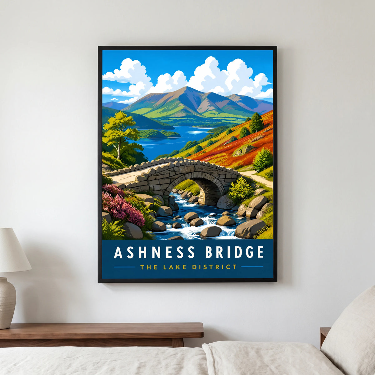 Ashness Bridge travel poster in a black frame, hanging in a bedroom3