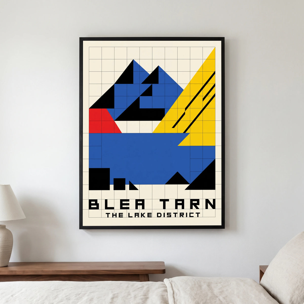 Blea Tarn travel poster in a black frame, hanging in a bedroom3