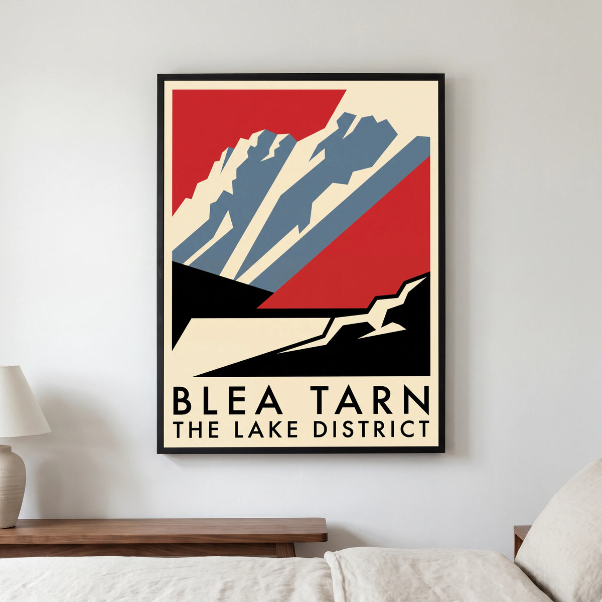 Blea Tarn travel poster in a black frame, hanging in a bedroom3