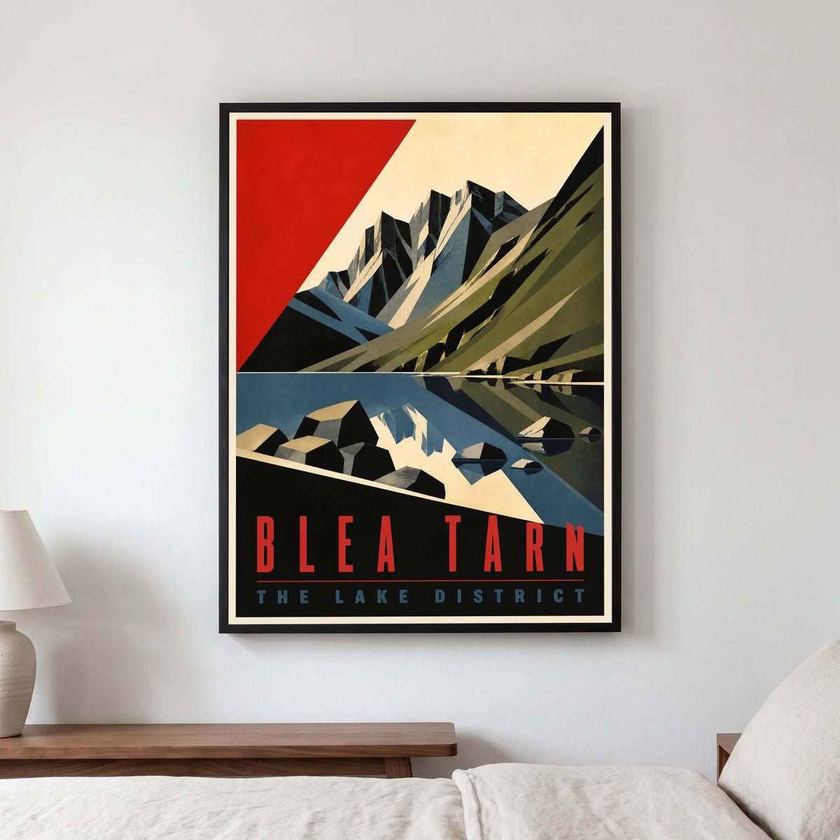 Blea Tarn travel poster in a black frame, hanging in a bedroom3