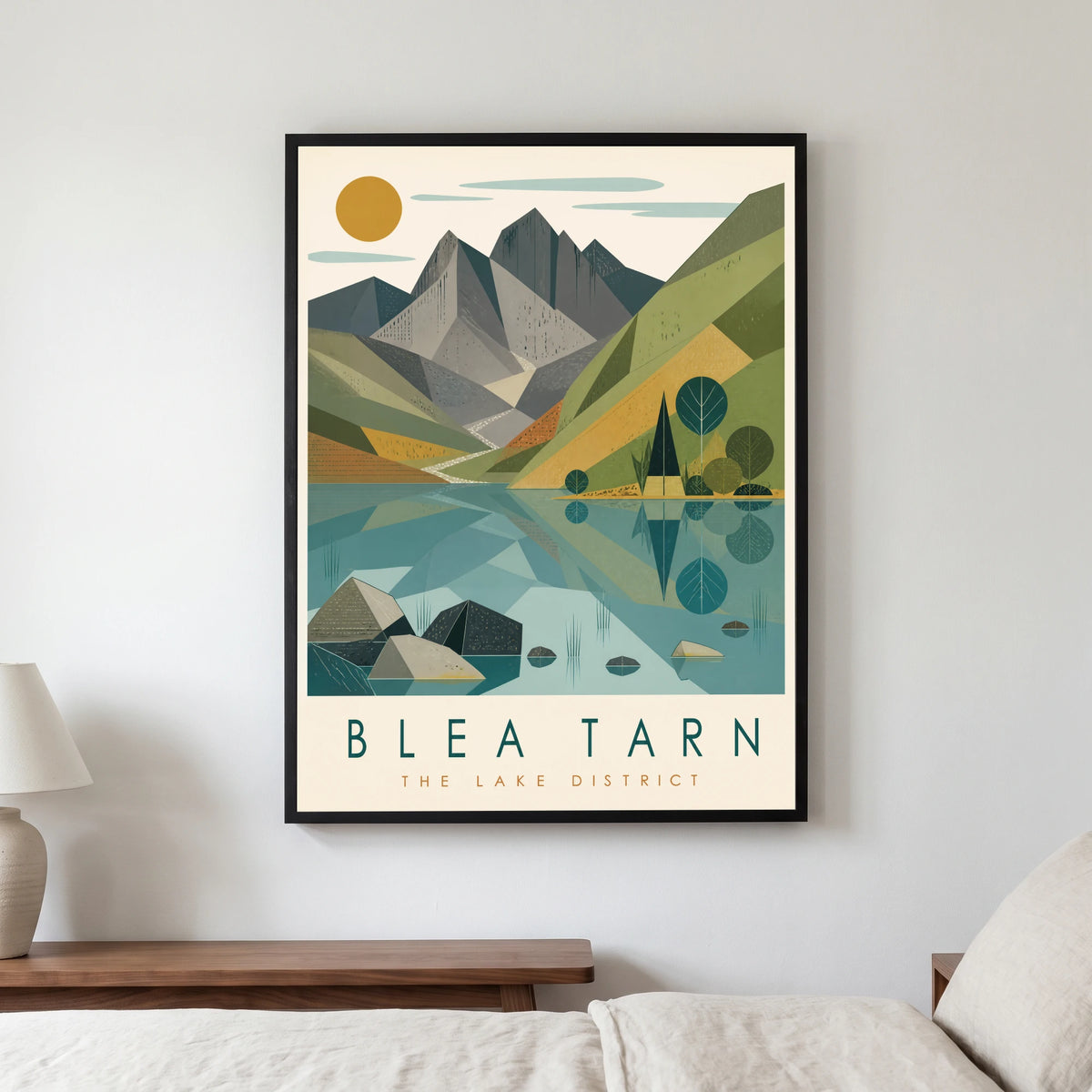 Blea Tarn travel poster in a black frame, hanging in a bedroom3