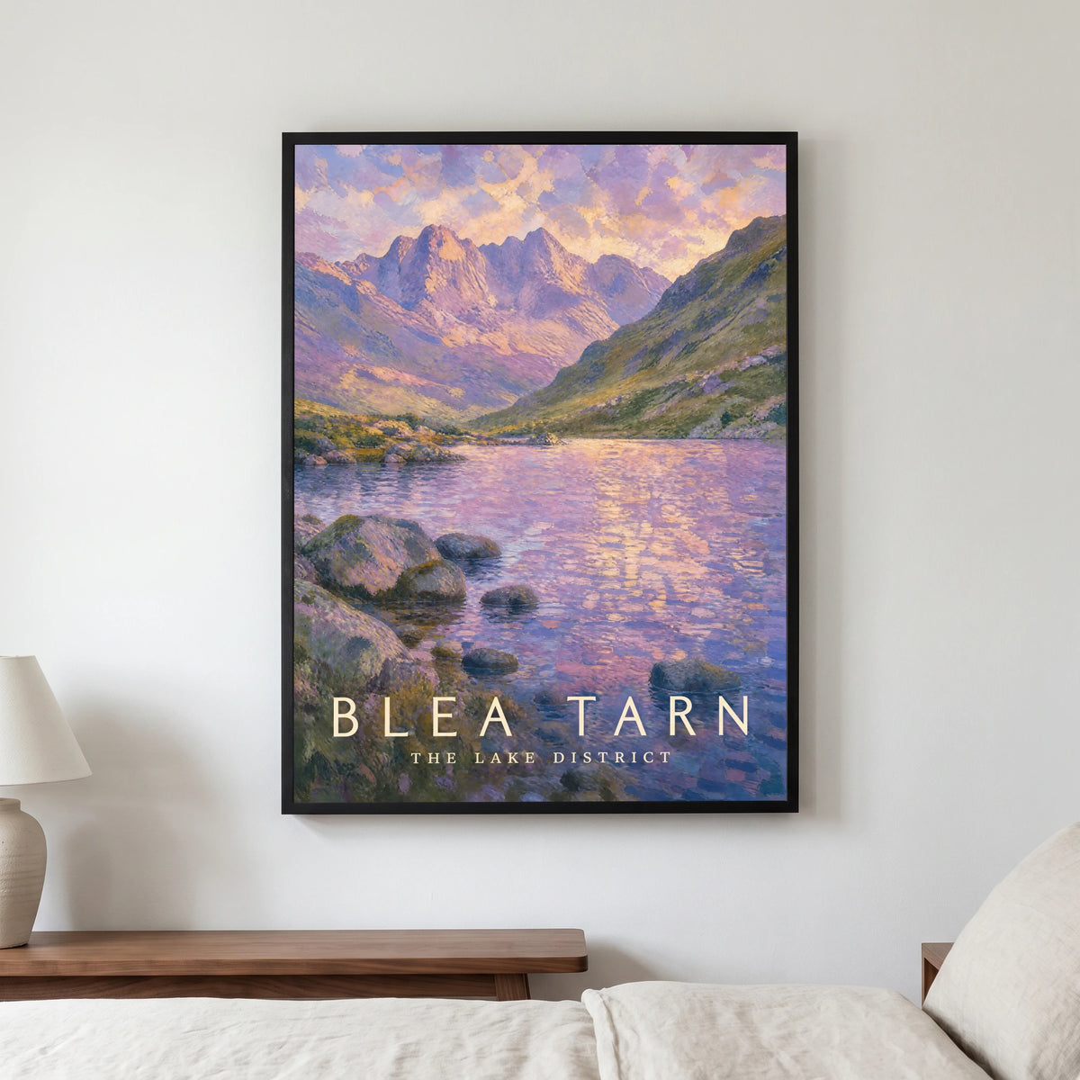 Blea Tarn travel poster in a black frame, hanging in a bedroom3