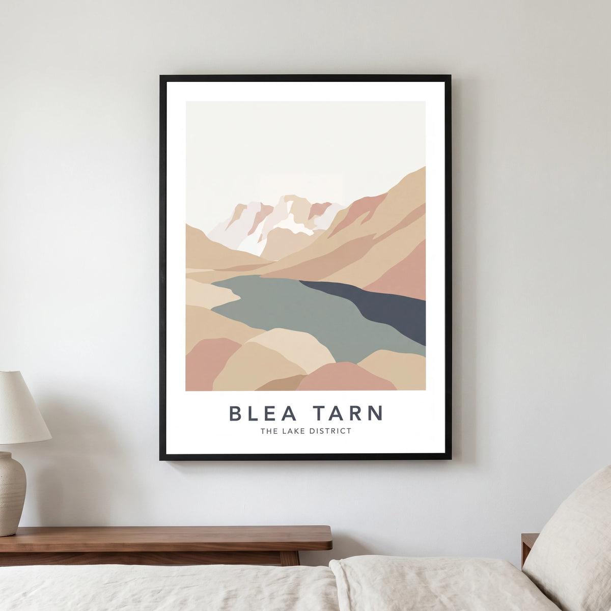 Blea Tarn travel poster in a black frame, hanging in a bedroom3