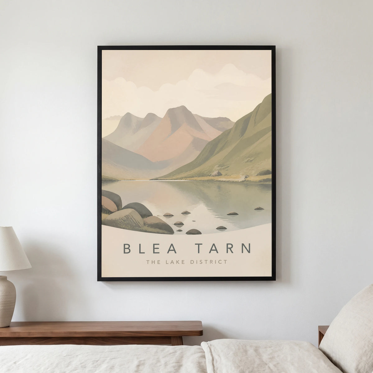 Blea Tarn travel poster in a black frame, hanging in a bedroom3