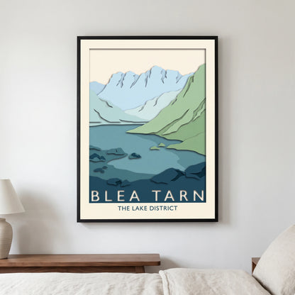 Blea Tarn travel poster in a black frame, hanging in a bedroom3