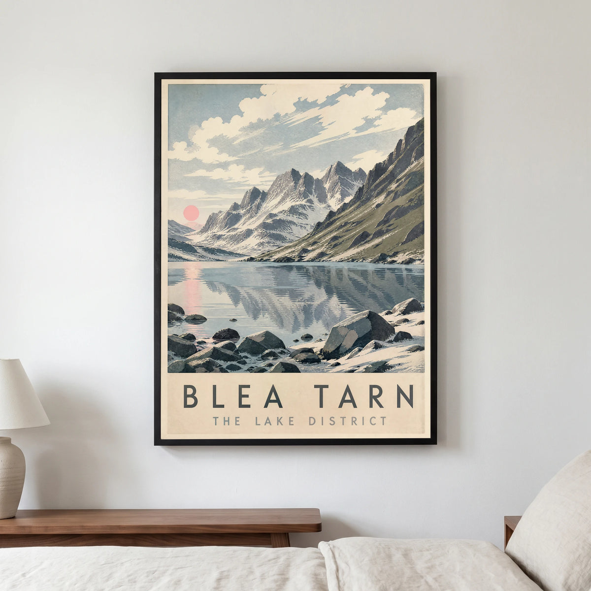 Blea Tarn travel poster in a black frame, hanging in a bedroom3