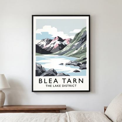 Blea Tarn travel poster in a black frame, hanging in a bedroom3