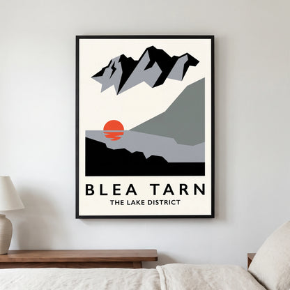 Blea Tarn travel poster in a black frame, hanging in a bedroom3