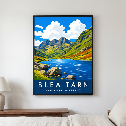 Blea Tarn travel poster in a black frame, hanging in a bedroom3