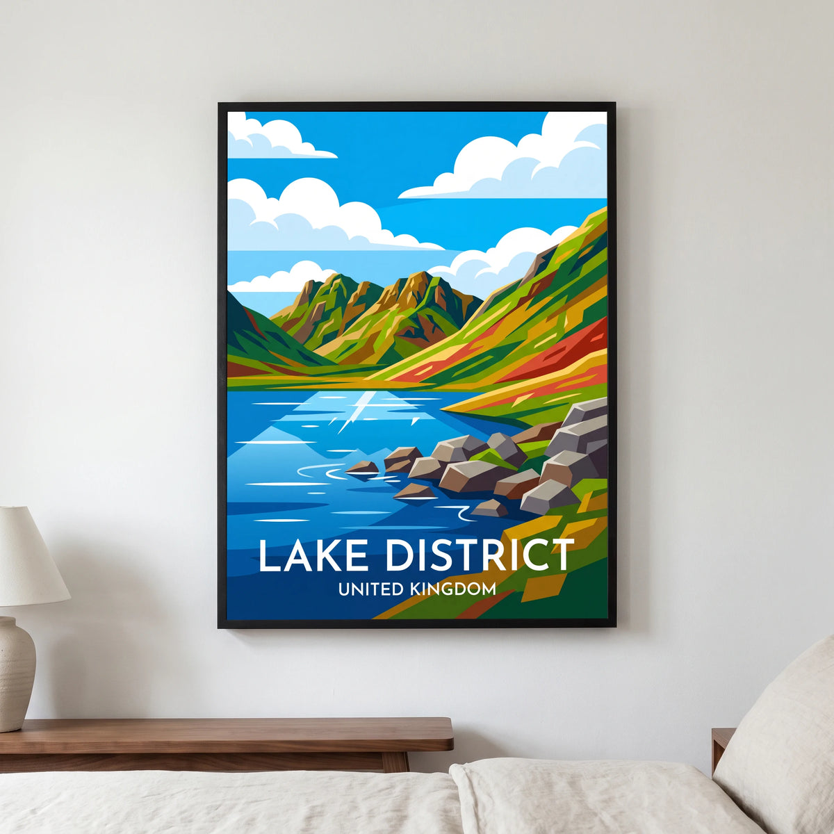 Blea Tarn travel poster in a black frame, hanging in a bedroom3